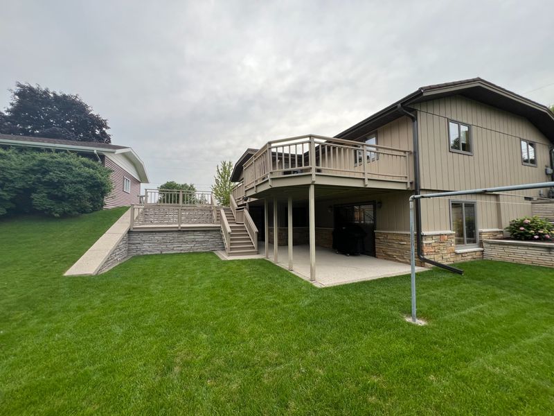 Deck and siding painting project in Manitowoc by Wisconsin's Best Painters